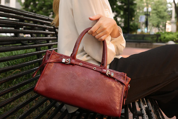 structured recycled vegan leather top-handle/crossbody bag